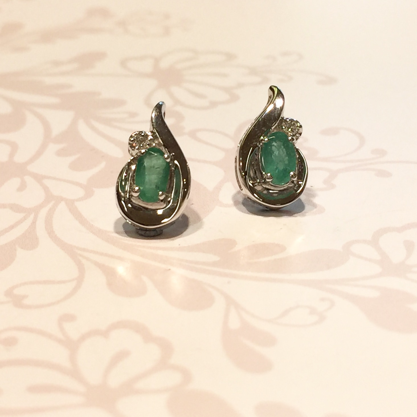9ct white gold oval emerald and diamond stud earrings