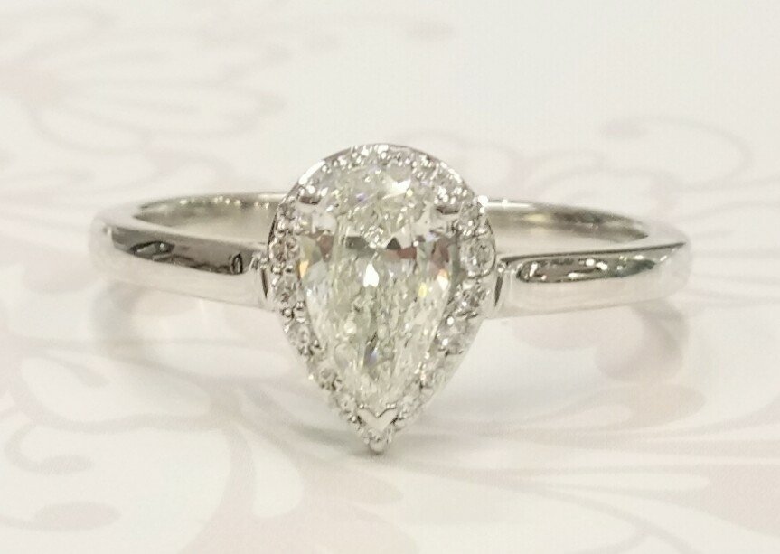 Pear shaped halo ring