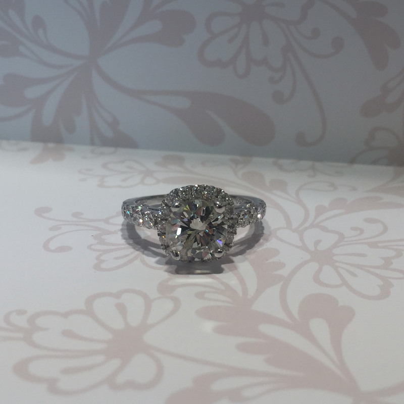 platinum halo set diamond ring