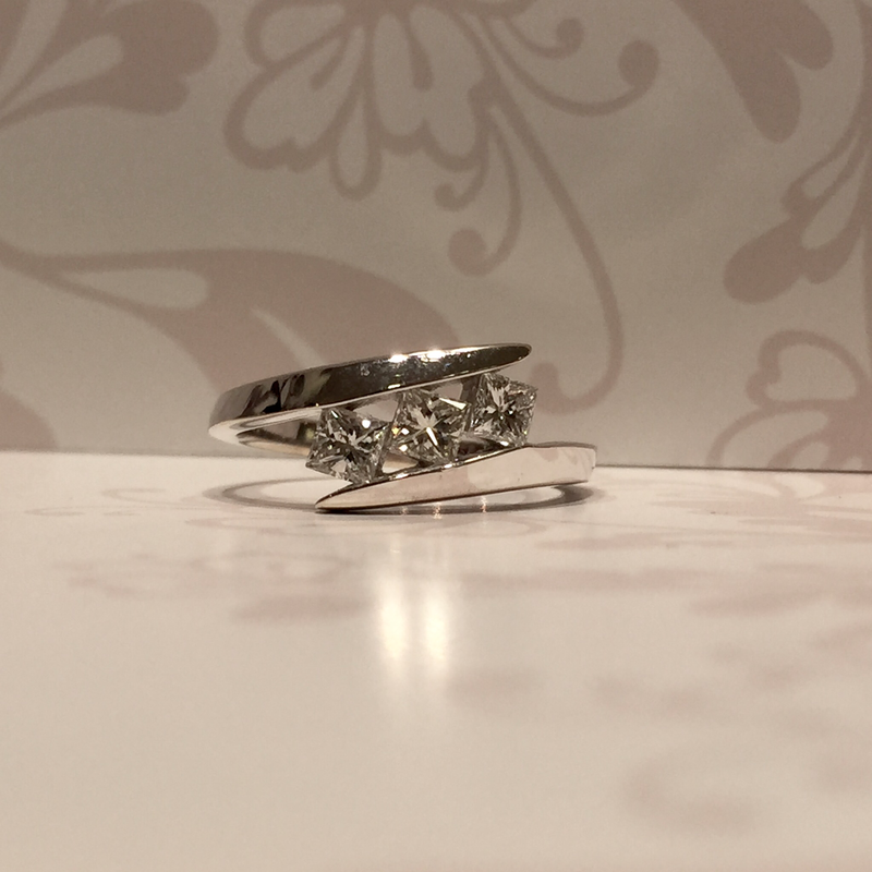 18ct white gold 3 stone princess cut ring