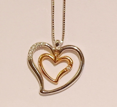 18ct rose and white gold diamond pendant