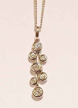 18ct white gold and diamond pendant