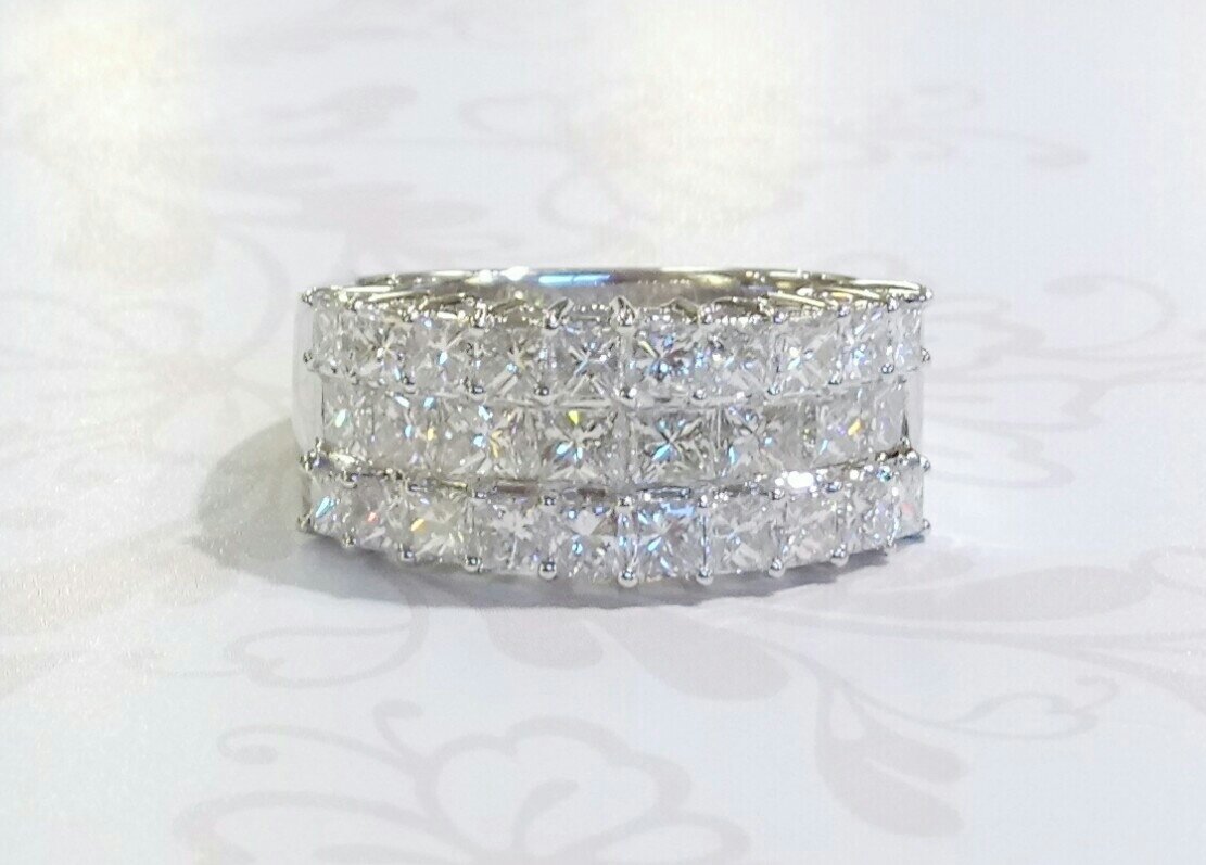 Platinum princess cut diamond dress ring