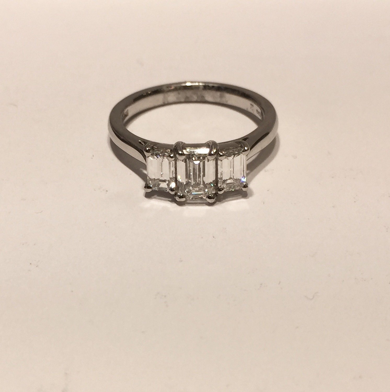 Platinum Emerald cut Diamond trilogy ring