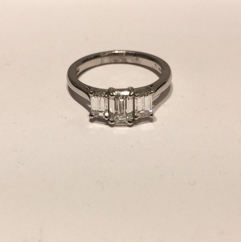 Platinum Emerald cut Diamond trilogy ring