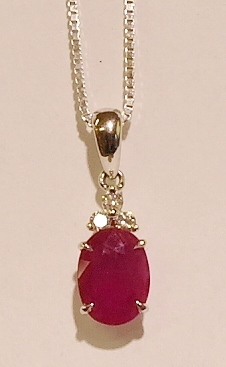 18ct white gold ruby and diamond pendant