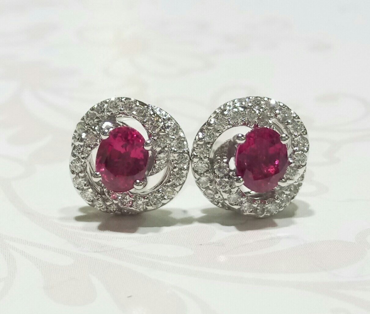 18ct white gold ruby and diamond spiral cluster earrings