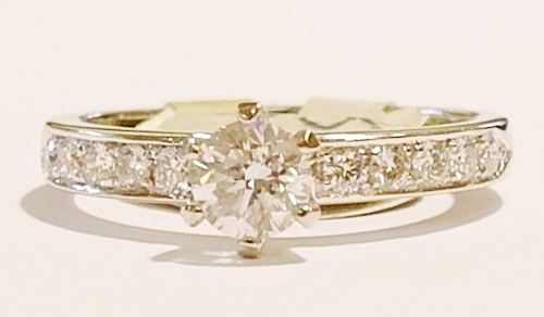 Platinum and diamond solitaire ring