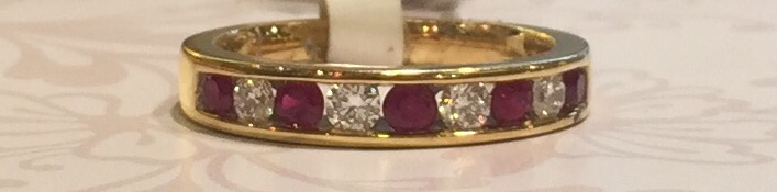 18ct ruby and diamond channel set ring