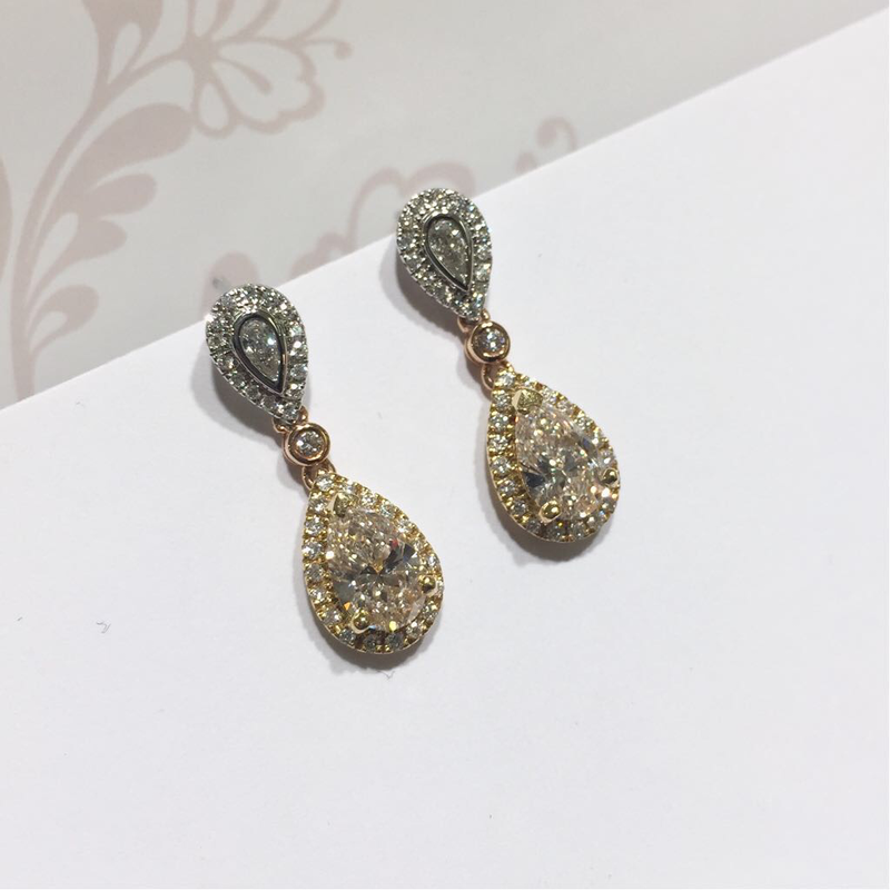 18ct gold pear shape diamond earrings