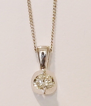 18ct white gold diamond pendant. 0.10ct