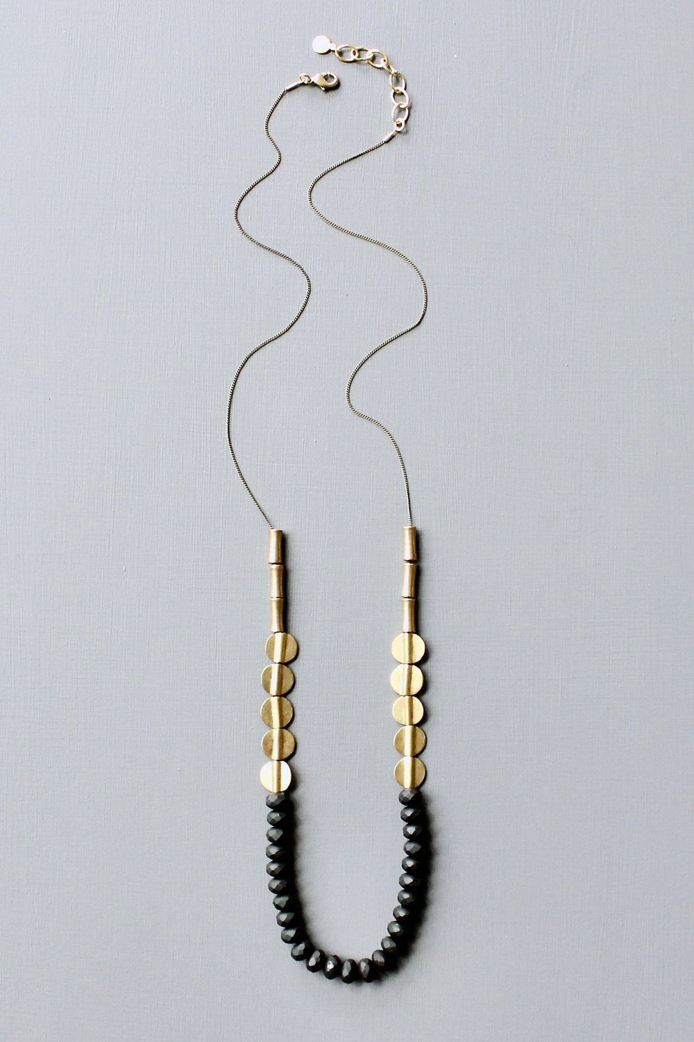JLT130 black and brass long necklace