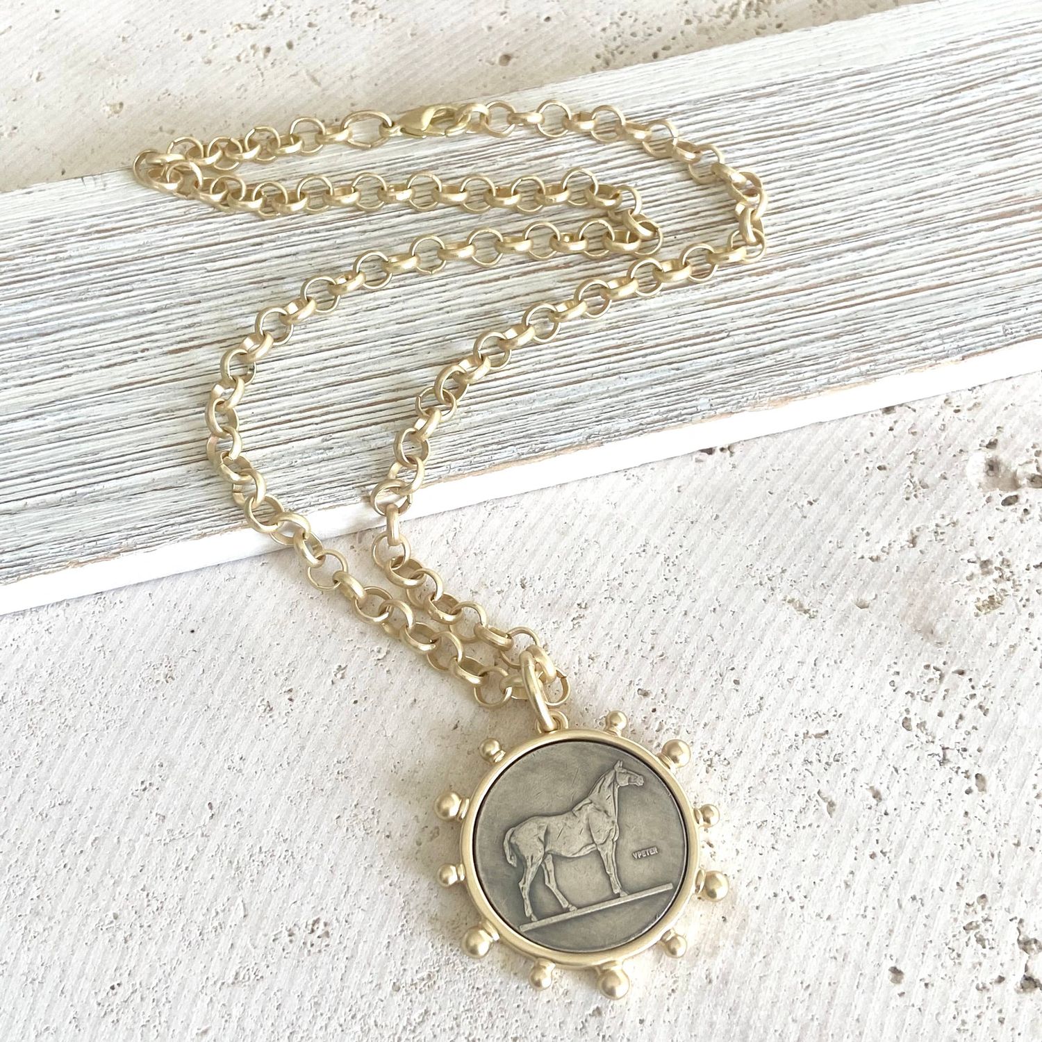Matte gold horse coin jewelry