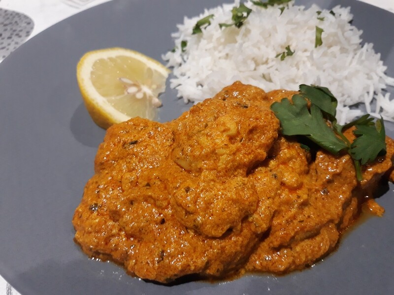 Turmeric and coriander chicken served with rice and made with a Case for Cooking spice kit