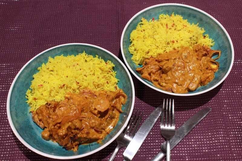 two plates of Roasted Coconut curry made with a Case for Cooking curry paste and served with rice 