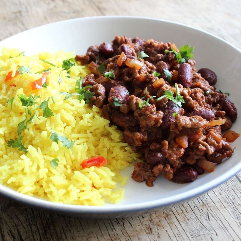 dish of beef chilli mince with rice. made with a jar of Case for Cooking Mexican-style chilli paste.