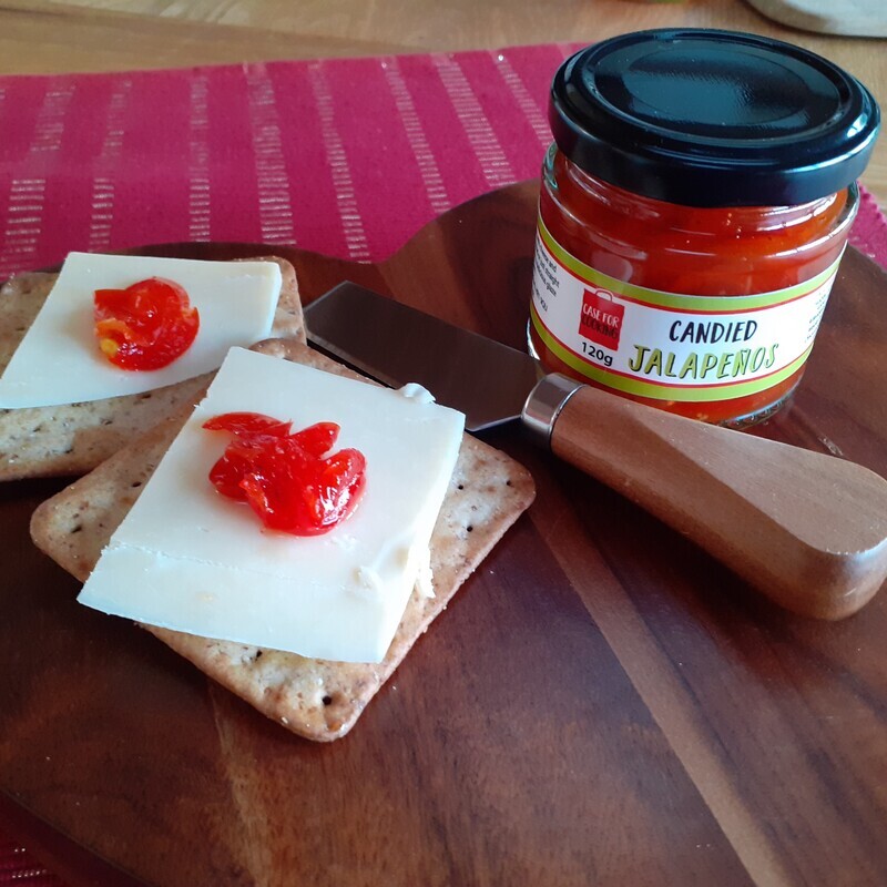 Cheese and crackers with candied jalapenos made by Case for Cooking 