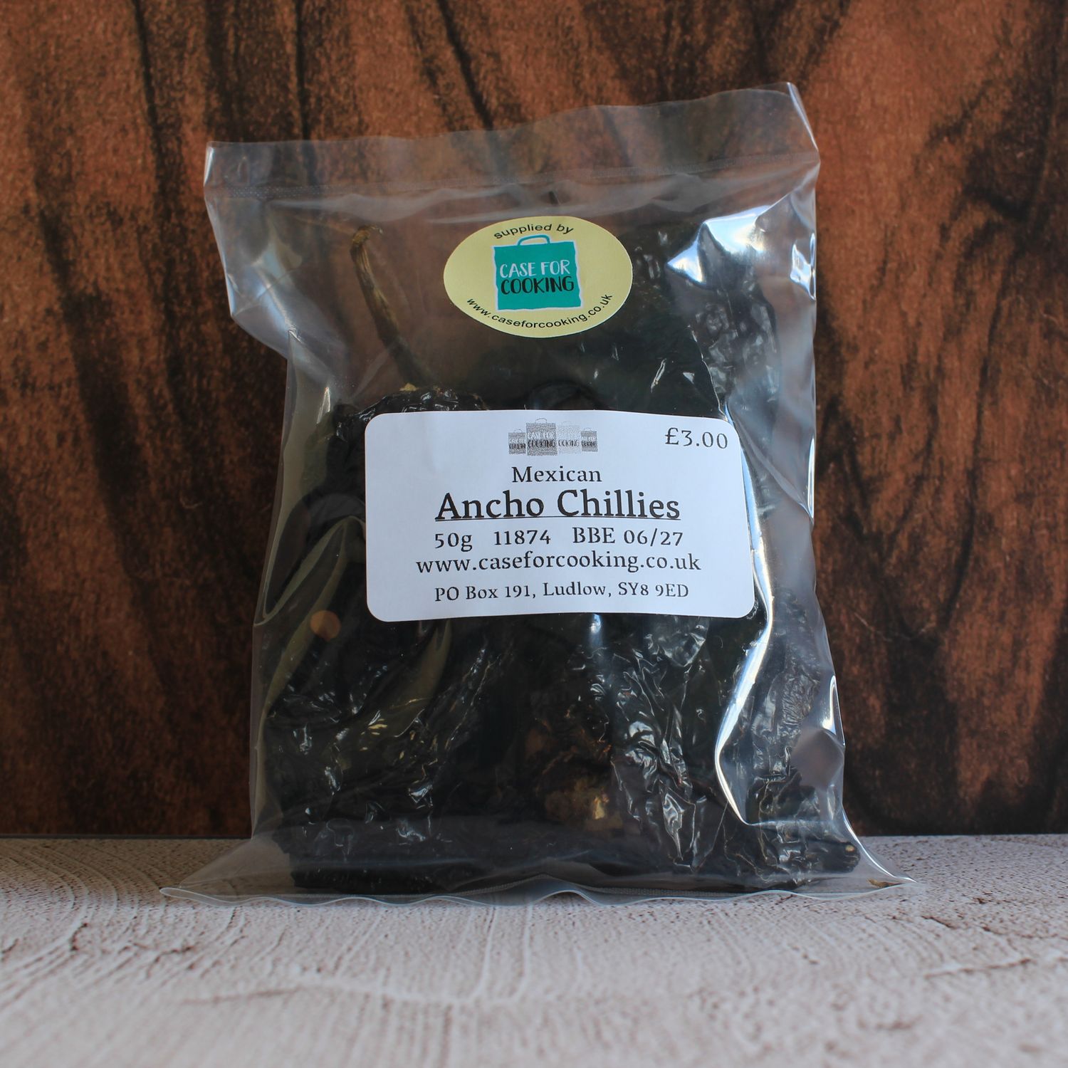 Packet of whole dried Ancho chillies sold by Case for Cooking 