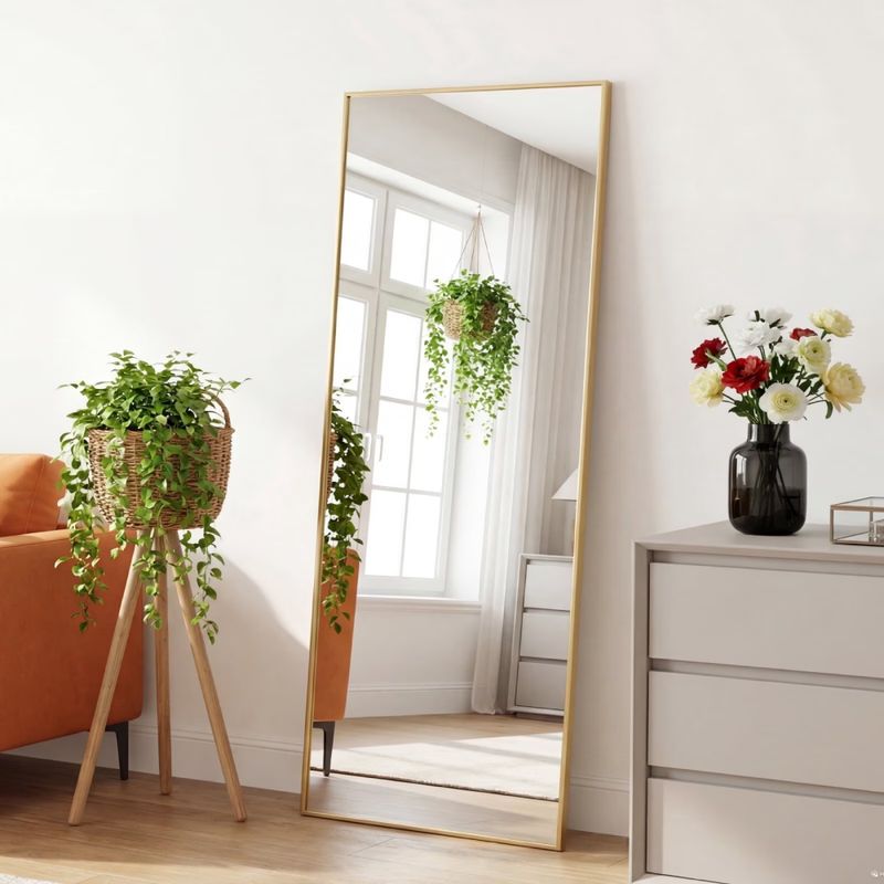 65-Inch Gold Rectangular Full-Length Mirror — full-length mirror in a room