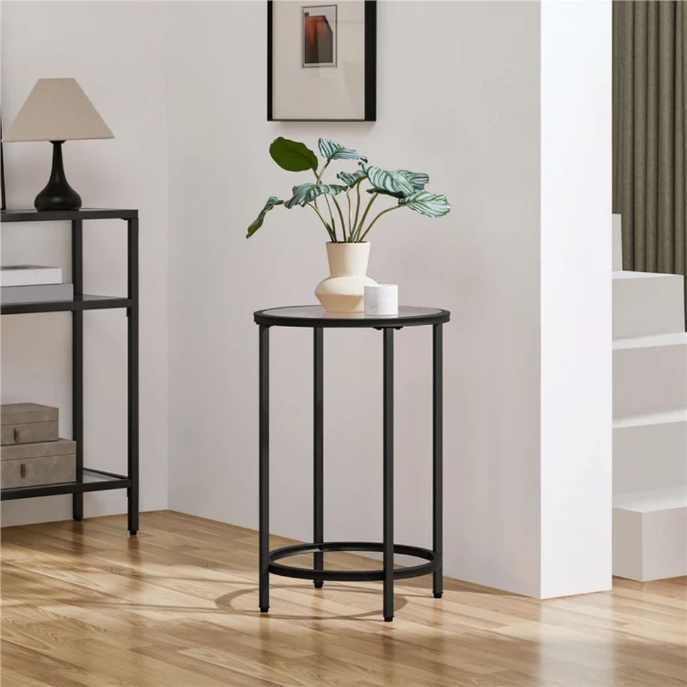 16-Inch Black Glass-Top Accent Table — accent table with a plant