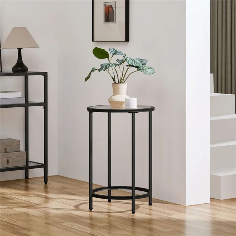 16-Inch Black Glass-Top Accent Table — accent table with a plant