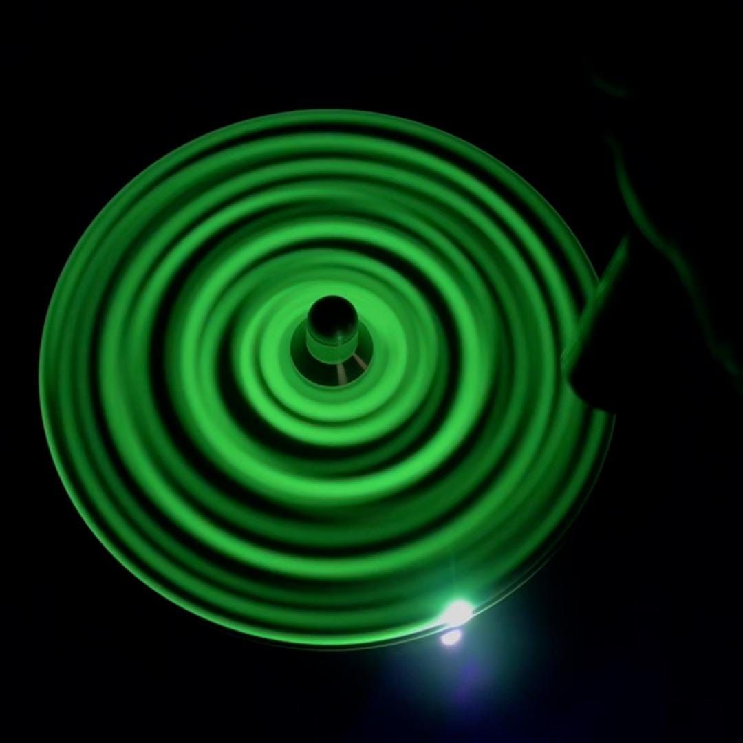 GlowTOP with UV Torch, Kinetic Art Rotating Optical Illusion Lamp Physics Desk Toy
