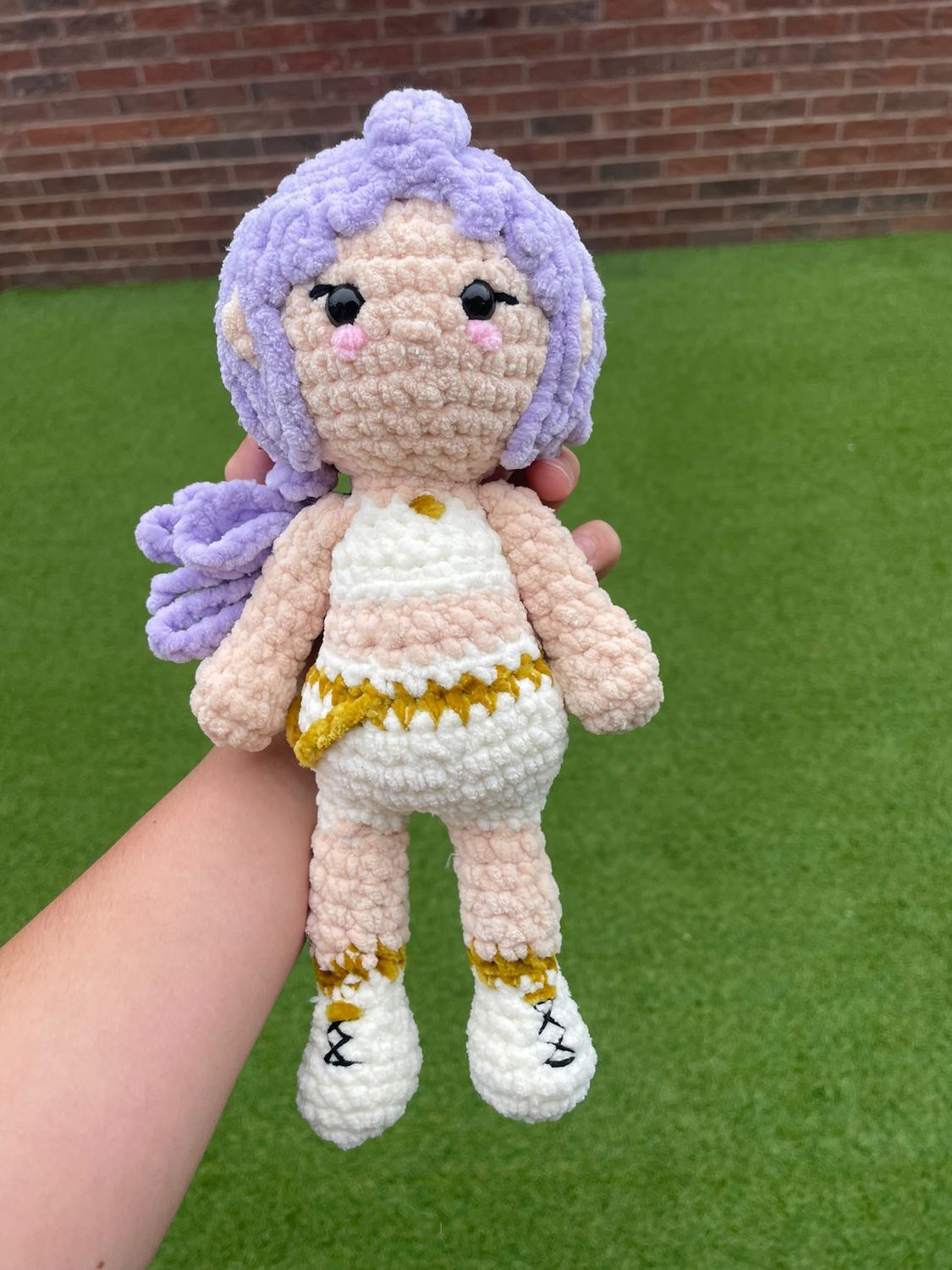 Cute crochet purple haired doll plushie from popular Kpop movie
