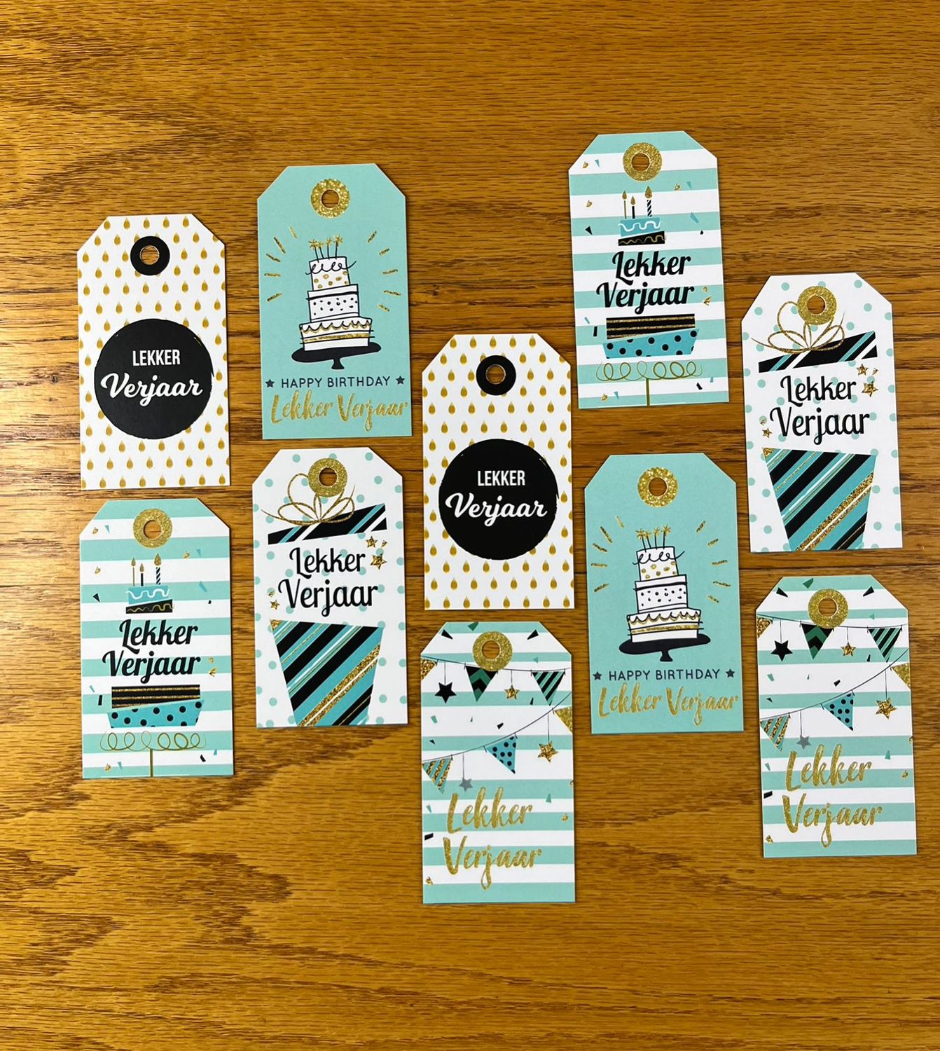 Teal black white and Gold Theme 1 Birthday Gift tags in Afrikaans