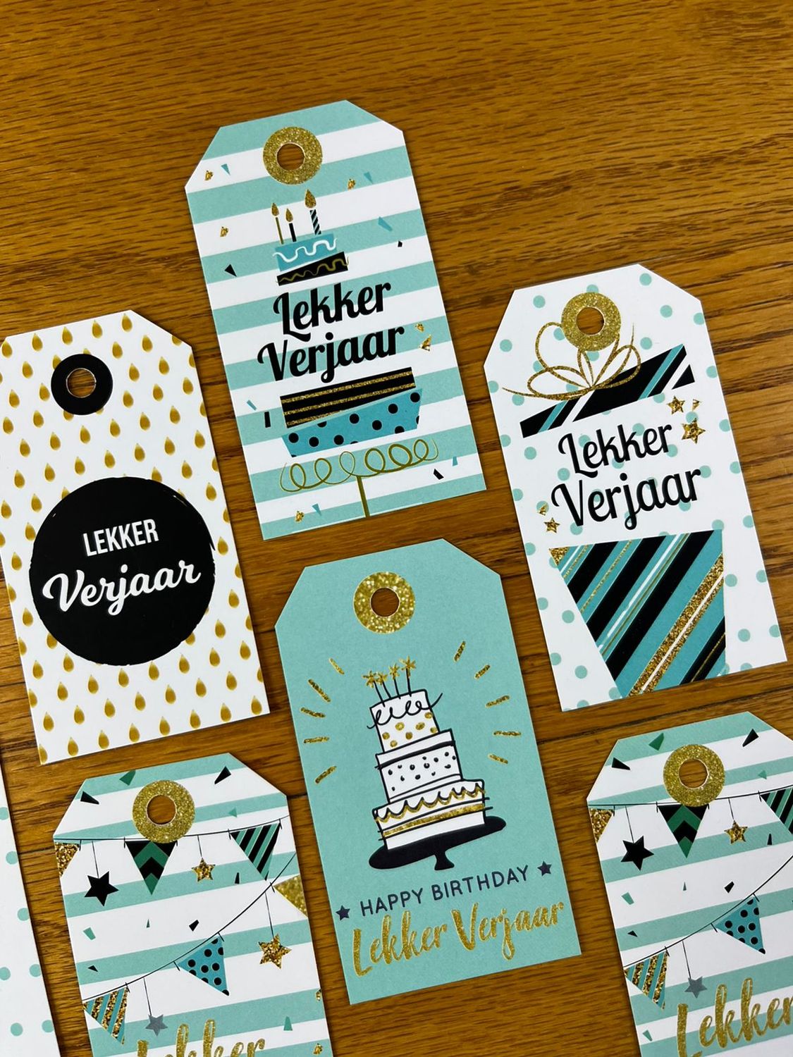 Teal black white and Gold Theme 1 Birthday Gift tags in Afrikaans