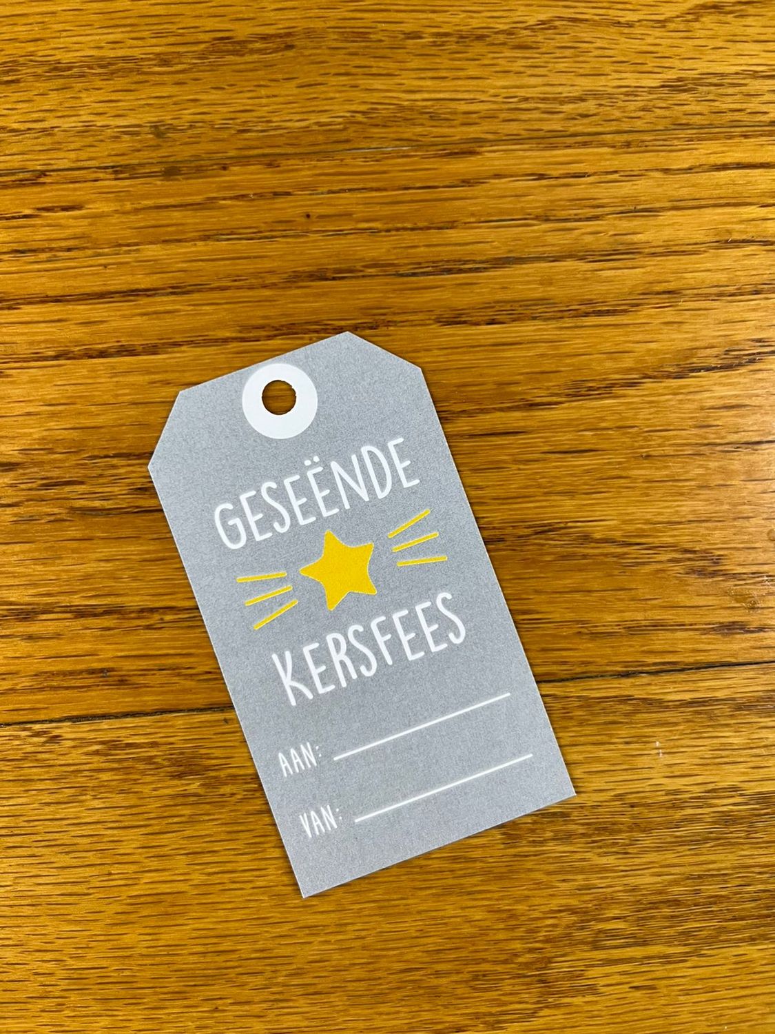 Light Grey and Star Christmas gift tag in Afrikaans