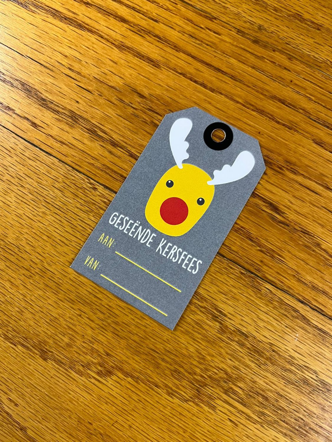Dark Grey and Reindeer Christmas gift tag in Afrikaans