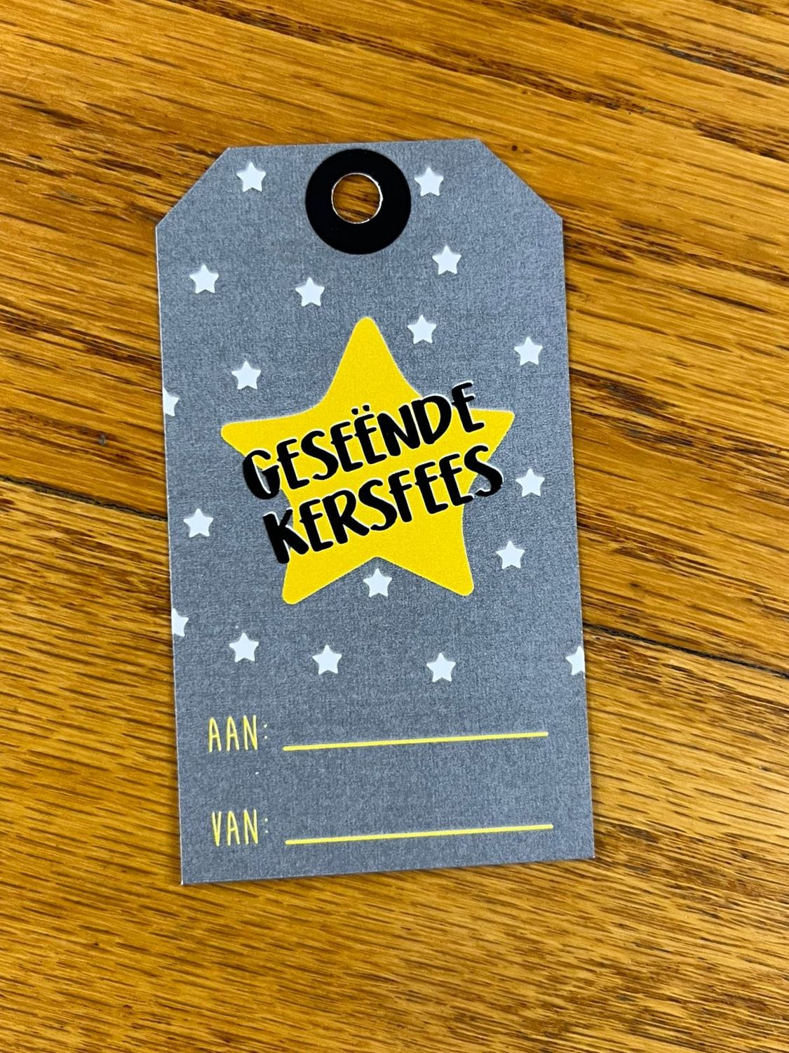 Dark Grey and Stars Christmas gift tag in Afrikaans