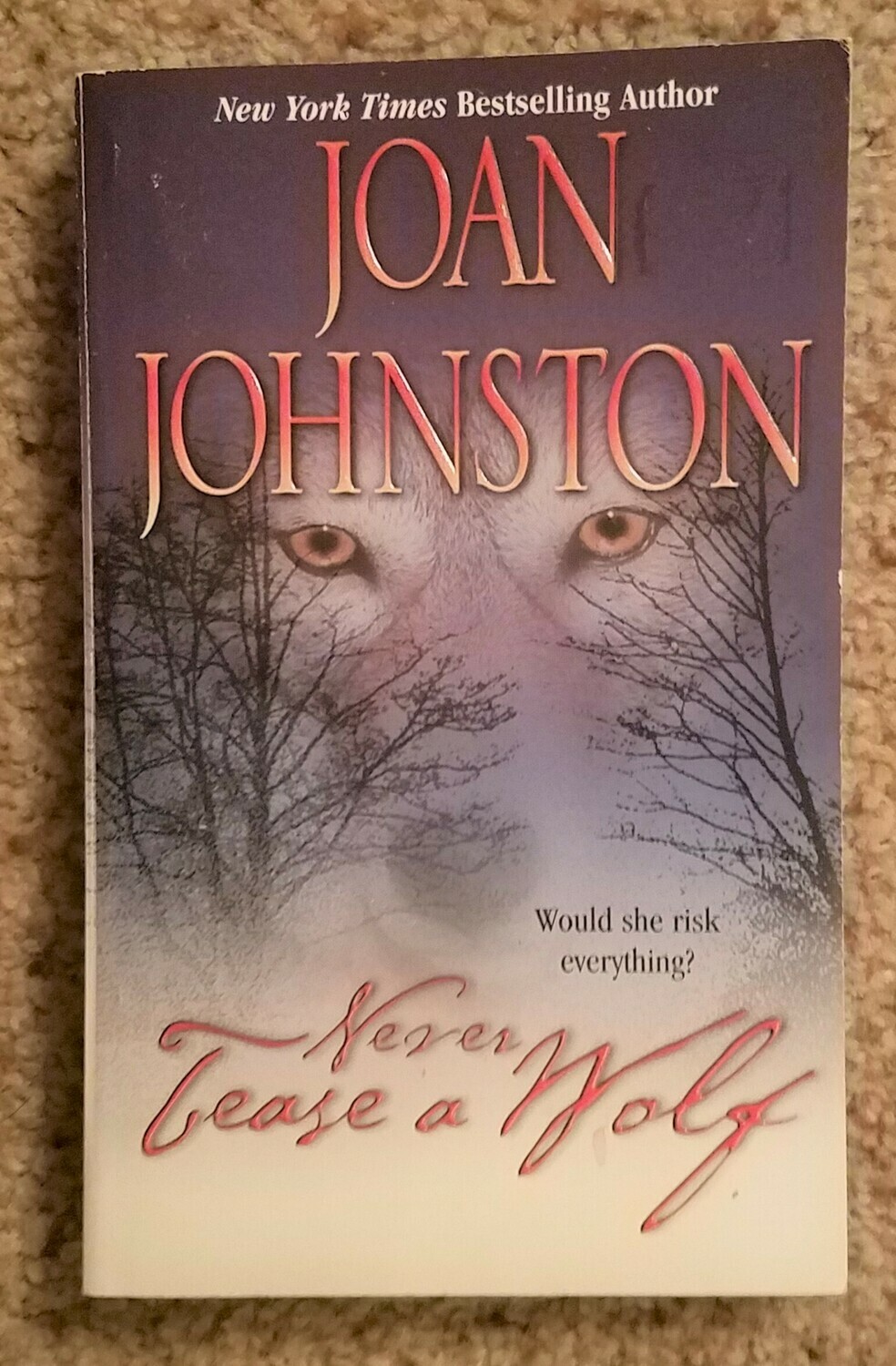 Never Tease a Wolf by Joan Johnston