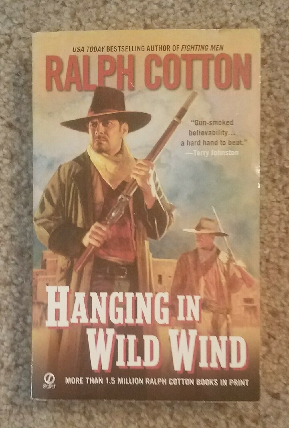 Hanging in Wild Wind by Ralph Cotton