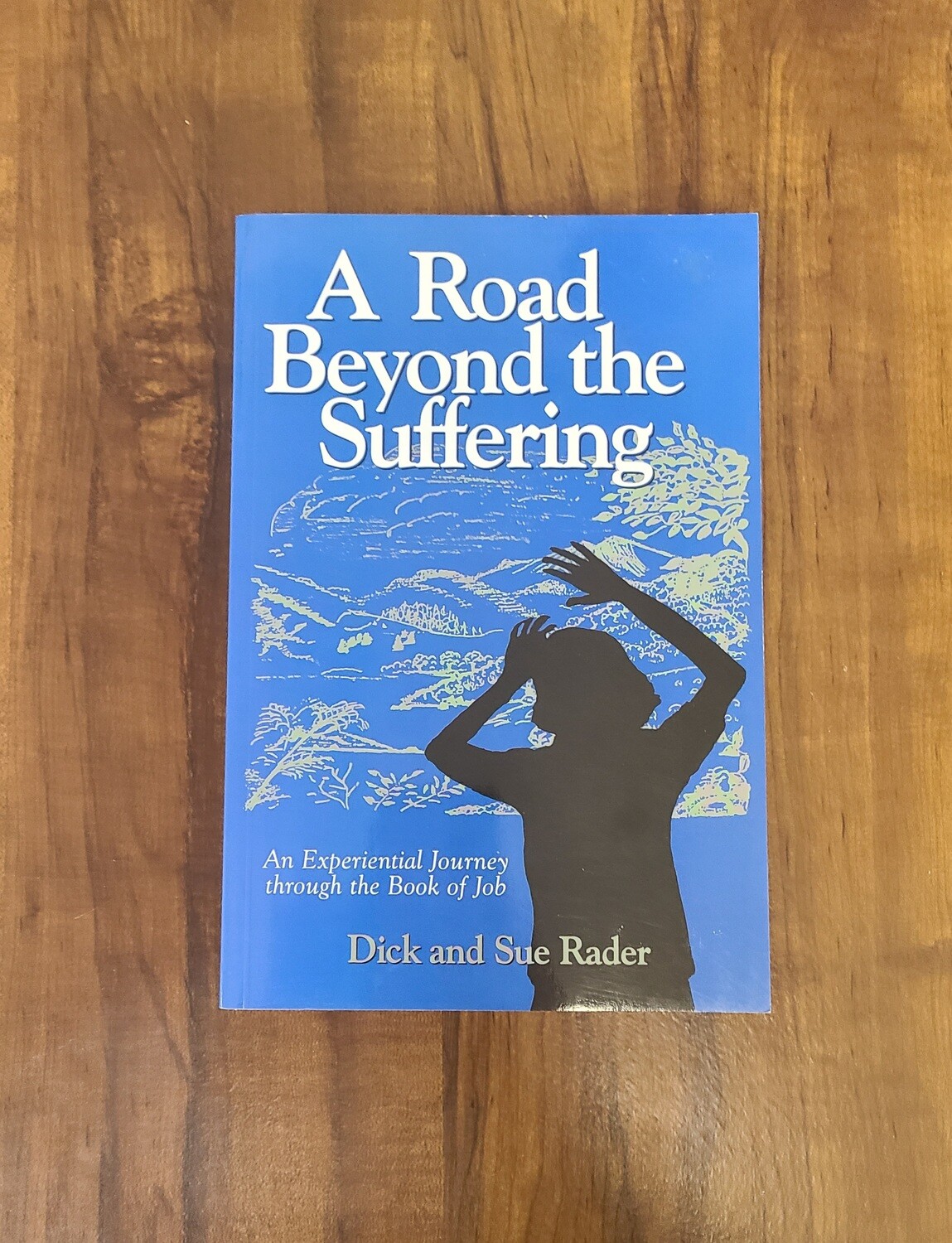 A Road Beyond the Suffering by Dick and Sue Rader