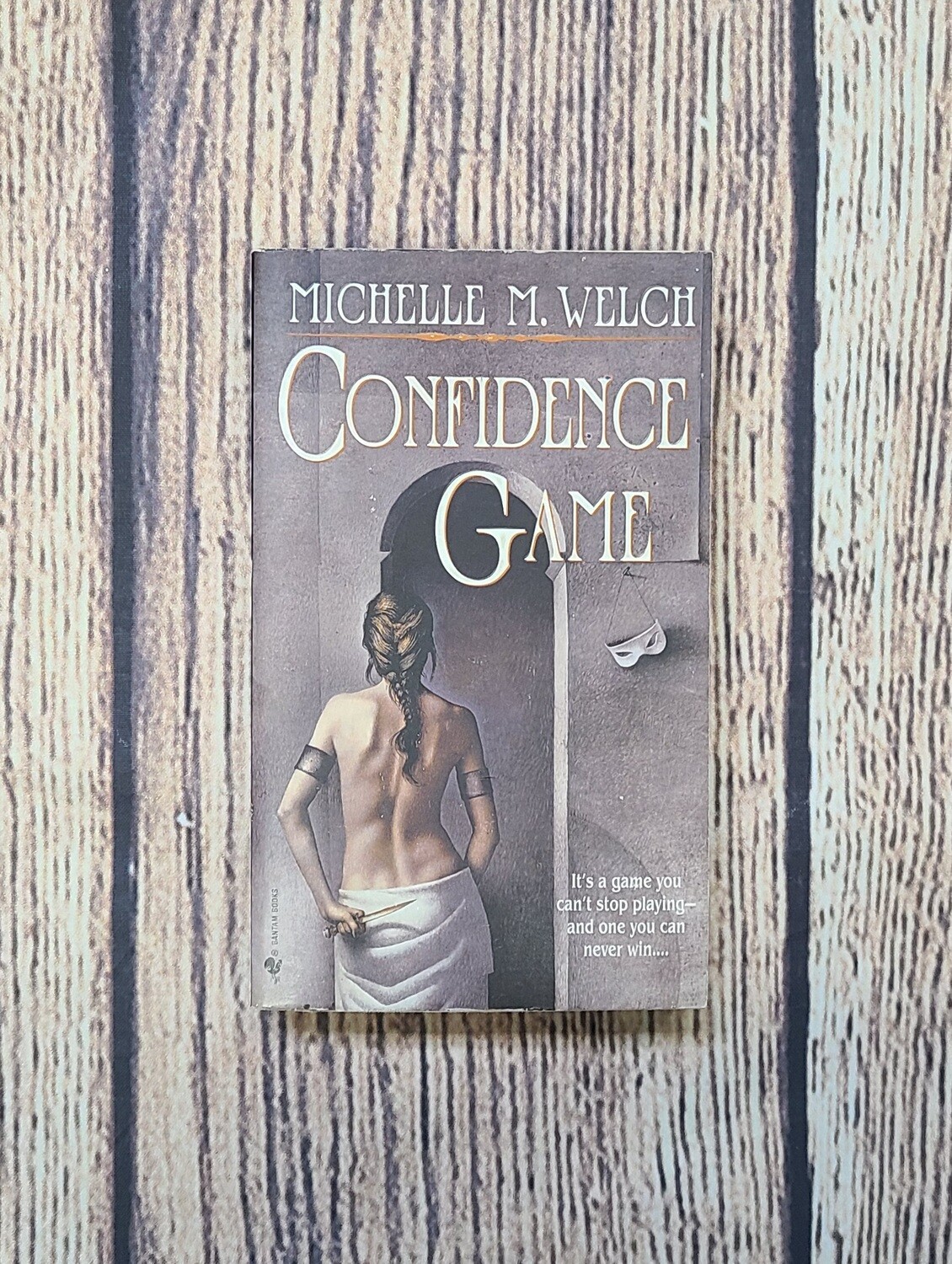 Confidence Game by Michelle M. Welch