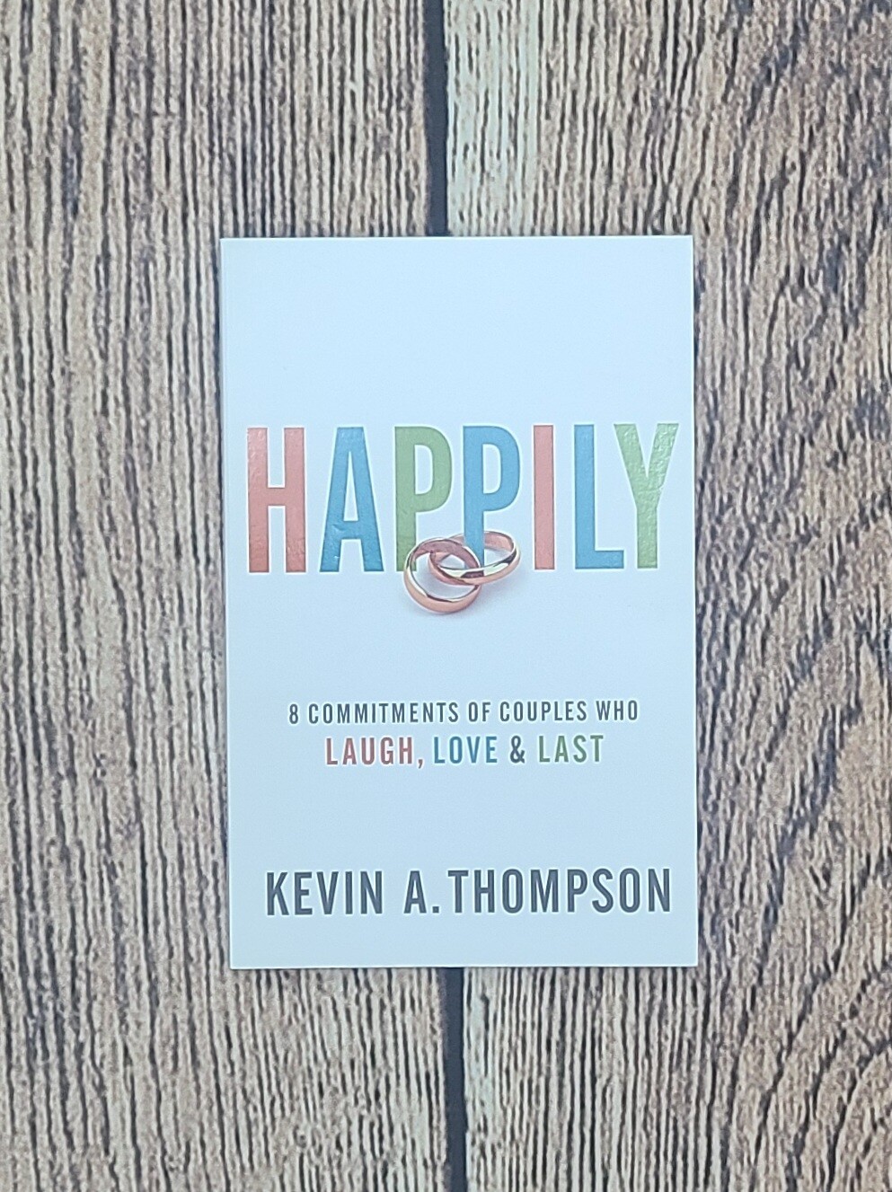 Happily: 8 Commitments of Couples Who Laugh, Love, and Last by Kevin A. Thompson