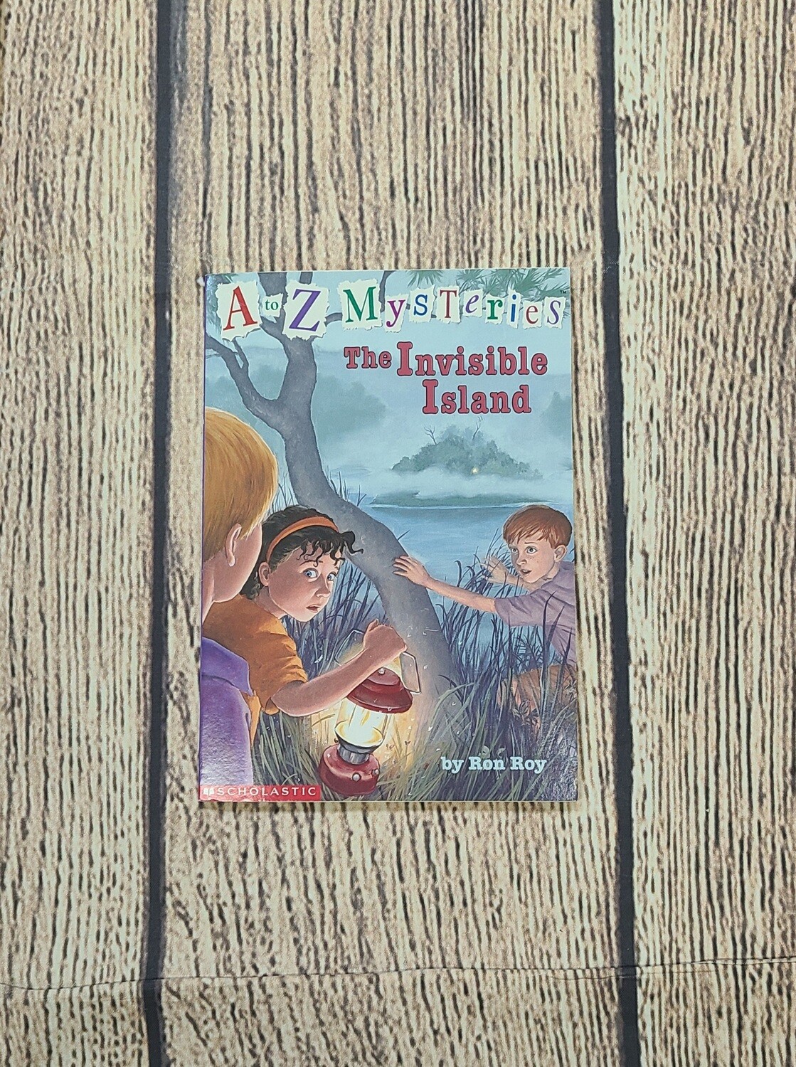 A to Z Mysteries: The Invisible Island by Ron Roy - Paperback - Great Condition