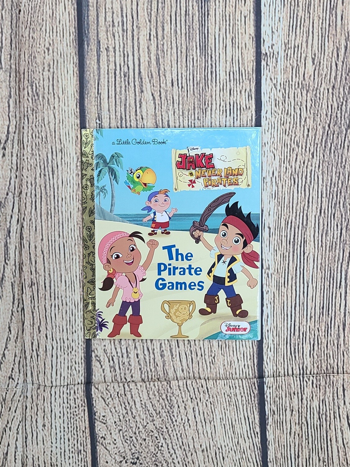 Jake and the Never Land Pirates: The Pirate Games adapted by Andrea Posner-Sanchez, story concept by Alessandro Sisti, and Illustrated by Stefania Fiorillo, Roberta Zanotta, and Giuseppe Fontana - Har