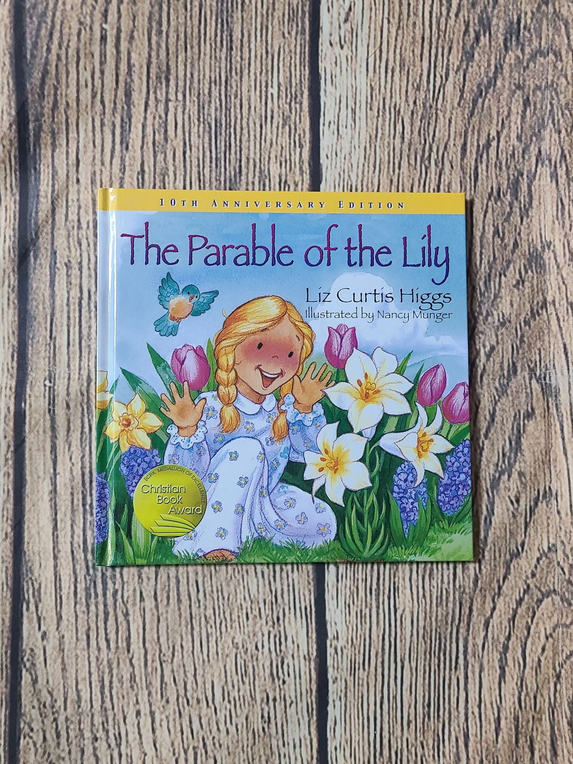 The Parable of the Lily: 10th Anniversary Edition by Liz Curtis Higgs and Illustrated by Nancy Munger - Hardback - New