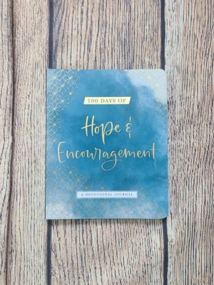 100 Days of Hope and Encouragement Devotional Journal by Christin Ditchfield and Cover Design by Hannah Skelton
