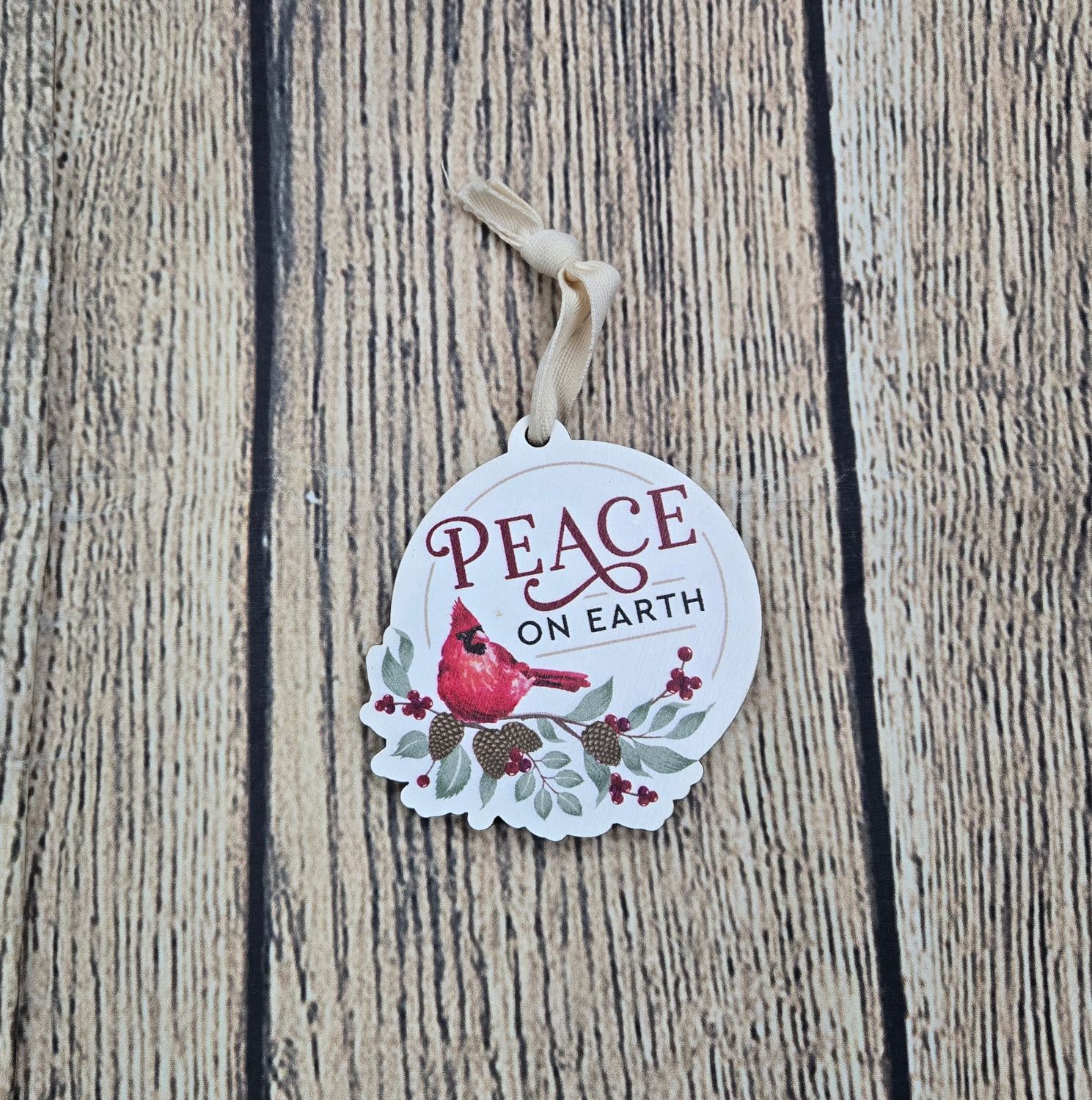 Peace on Earth Cardinal Wooden Ornament
