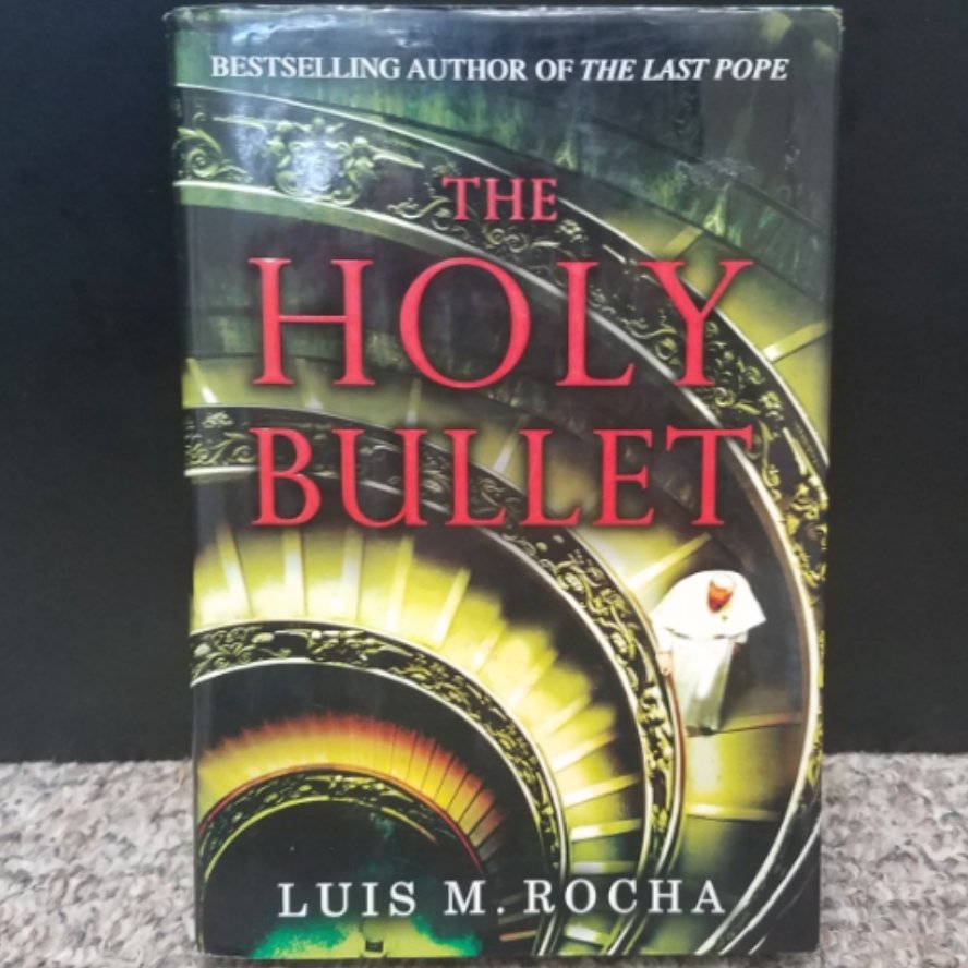 The Holy Bullet by Luis M. Rocha