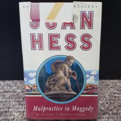 Malpractice in Maggody by Joan Hess