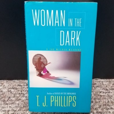 Woman in the Dark by T.J. Phillips