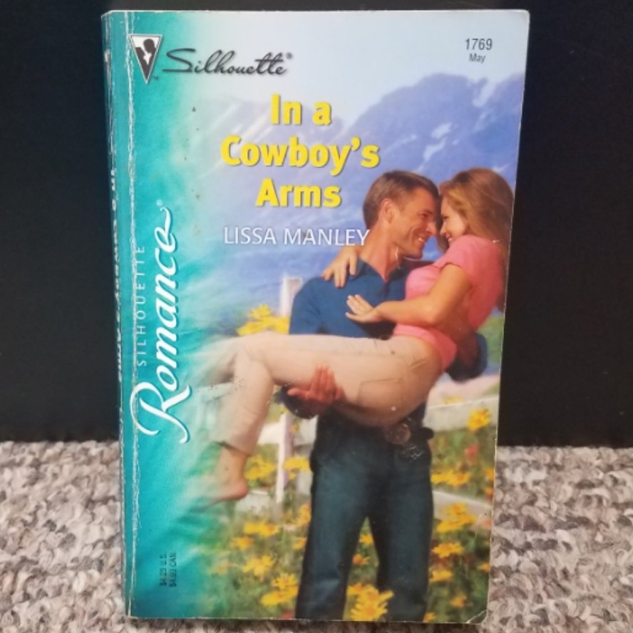 In A Cowboy&#39;s Arms by Lissa Manley