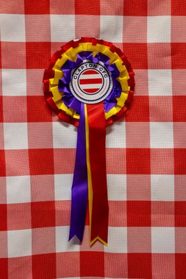 Clapton CFC away colours rosette