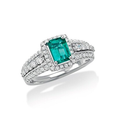 Anello con smeraldo centrale e diamanti