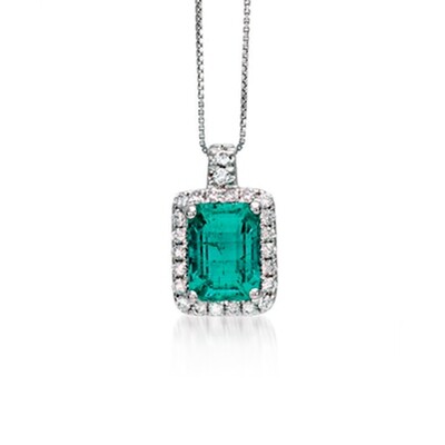 Pendente con smeraldo contornato da diamanti