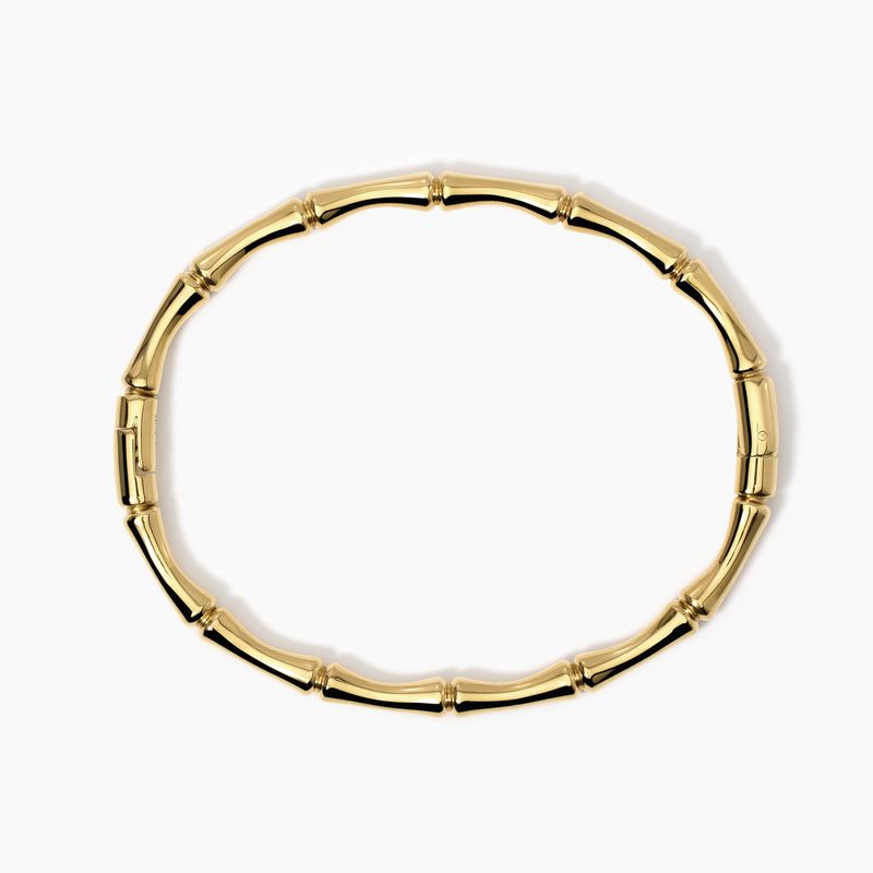 Bracciale rigido effetto bamba' in acciaio dorato Kidult